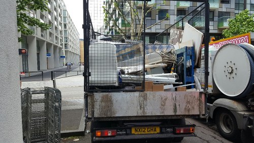 Professional clearance team removing furniture from a home