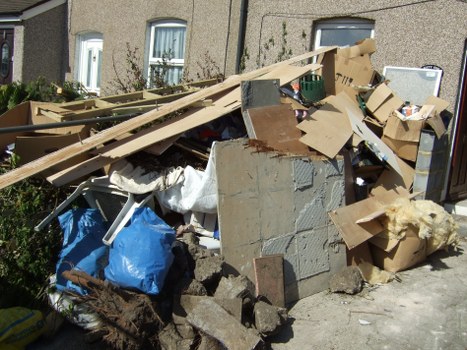Safe, insured rubbish removal team completing a final site check